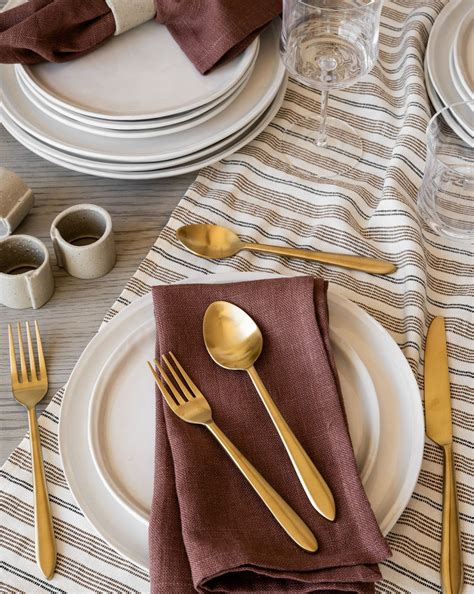 Timeless and versatile, the Striped Tablecloth is crafted from a linen ...