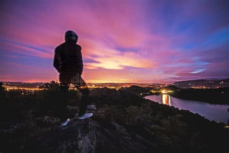 Man On Cliff At Sunset Picture. Image: 83062846