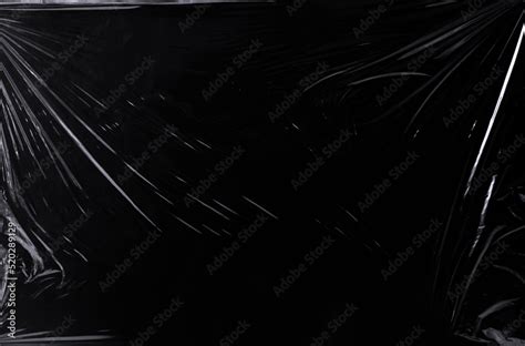 Black transparent plastic wrap texture overlay background. Realistic ...