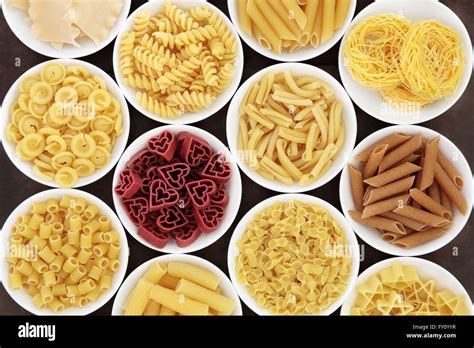 Italian dried pasta shapes in white porcelain bowls Stock Photo - Alamy