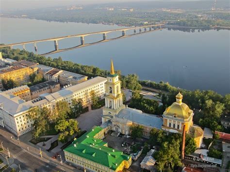 an aerial view of the city and river