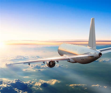 Airplane Flying Above Clouds in Dramatic Sunset Stock Image - Image of clouds, airplane: 78309137