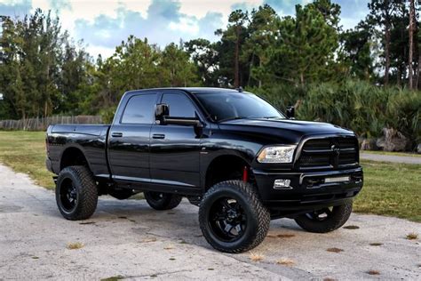 Lifted Dodge Ram With Custom Touches and Colormatched Fuel Wheels