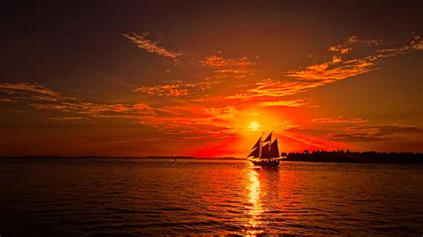 Download Silhouette Sunset Ocean Nature Sailboat Vehicle HD Wallpaper