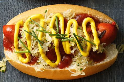 Sauerkraut, pickle and mustard hot dogs