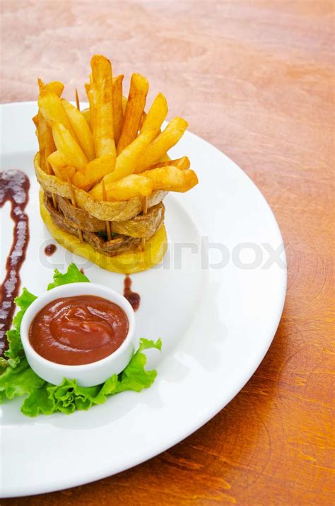 French fries served with ketchup | Stock image | Colourbox