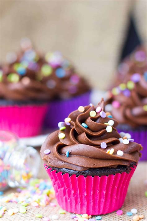 Dark Chocolate Cupcakes with Fresh Raspberry Frosting - Sugar Spun Run