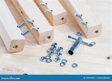 Bolts and Nuts for the Assembly of Wooden Furniture Stock Image - Image of craft, board: 185994931