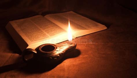 Oil lamp and Bible. Oil lamp and open Bible shot at a single flame light , #Sponsored, #Bible, # ...