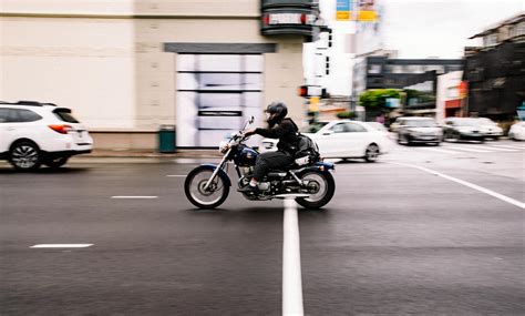 Person Riding Cruiser Motorcycle · Free Stock Photo