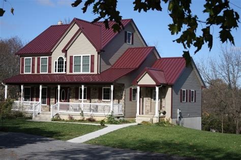 red metal roof house exterior ideas | Metal roof colors, Red roof house ...