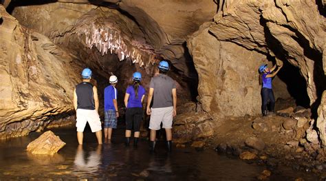 Explore a world indifferent to the light at the Venado Caves Experience