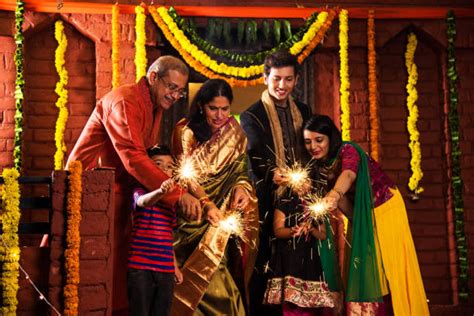 Royalty Free Diwali Family Pictures, Images and Stock Photos - iStock