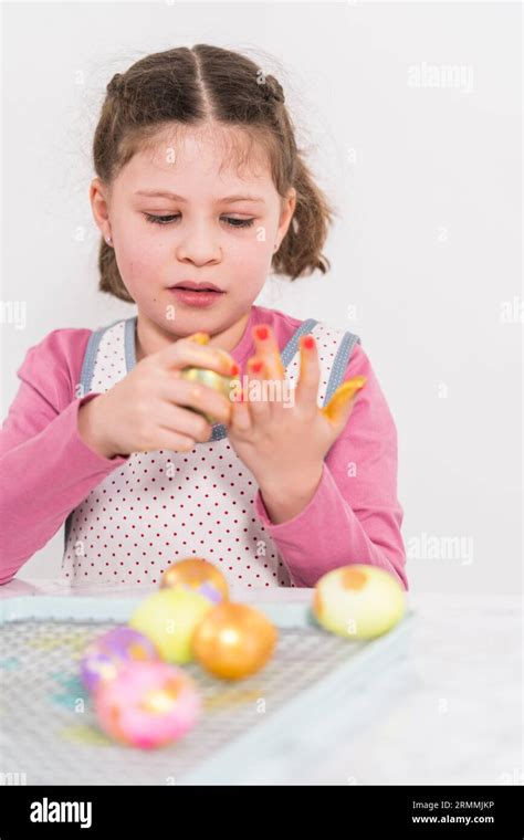 Easter egg coloring Stock Photo - Alamy