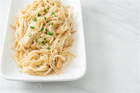 stir-fried golden needle mushroom with butter 6167165 Stock Photo at ...