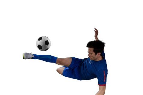 Close up of a football action scene with soccer player kicks a soccerball 21085059 PNG