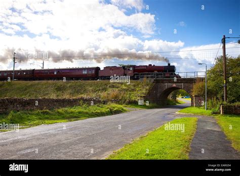 Steam locomotive LMS Jubilee Class 45699 Galatea at Plumpton, Cumbria, England, UK Stock Photo ...