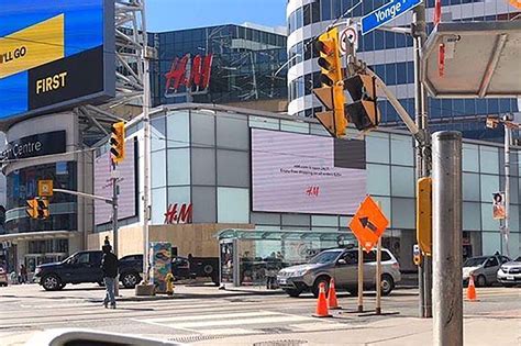 The Toronto Eaton Centre is now boarded up and surrounded by barricades