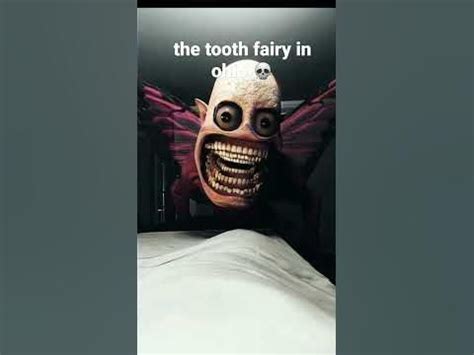 an advertisement for tooth fairy in the middle of a bed with a creepy face on it