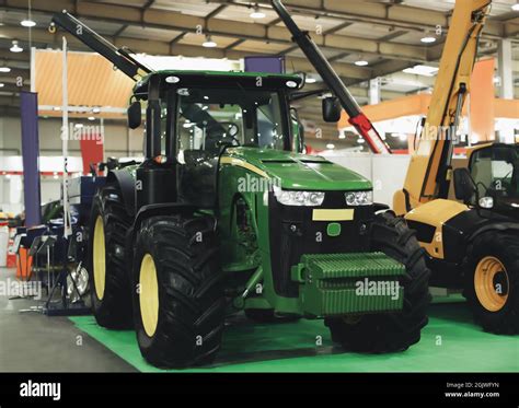 Modern tractor on agricultural exhibition Stock Photo - Alamy