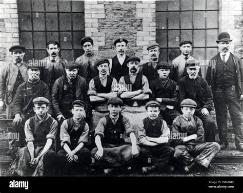 Workmen and apprentices of the Skewen Colliery repair shop in Glamorgan, South Wales, in a group ...