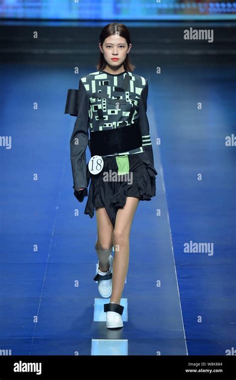 A model displays a new creation at Hempel Award - The 23rd China International Young Fashion ...