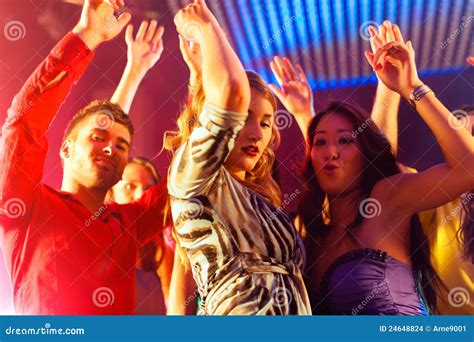 Party People Dancing In Disco Or Club Stock Images - Image: 24648824