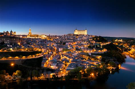 General view of Toledo in night time. Spain by Daniel Viñé Garcia ...