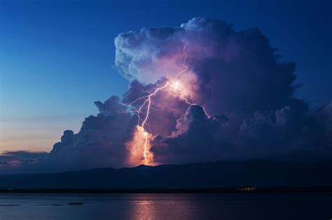 Isolated cumulonimbus cloud with positive lightning | Clouds, Lightning ...