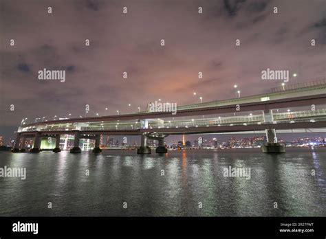 The night view of Odaiba Rainbow Bridge Stock Photo - Alamy