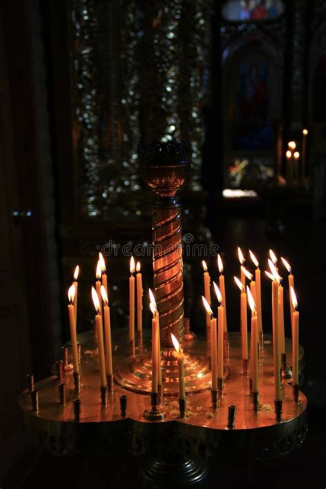 Church Candles Burning in Candlesticks in Darkness Stock Image - Image ...