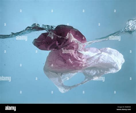 Pollution problem - plastic bag in the ocean Stock Photo - Alamy