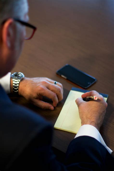 Person Writing Notes on White Ruled Paper · Free Stock Photo