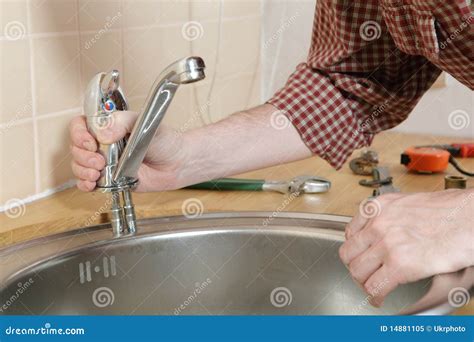 Kitchen Tap Installation Royalty Free Stock Photo - Image: 14881105