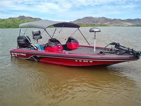 Fishing Safaris: Nitro Z7 Bass Boat with a Bimini Top