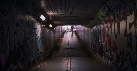 Empty Tunnel With Graffiti on Wall · Free Stock Photo