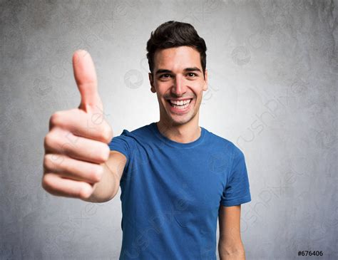 Happy smiling man giving thumbs up - stock photo 676406 | Crushpixel