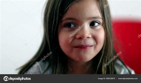 Little Girl Sad Face Emotion Close Portrait Stock Photo by ©zanuckcalilus 680220970