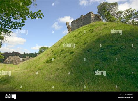 The ruins of Okehampton Castle showing the keep on the summit of a manmade hill Okehampton Devon ...