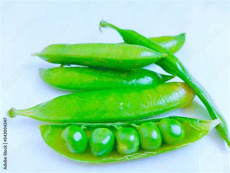 Green Peas pods legume raw pea fresh matar vegetable food Pisum sativum seed-pod P. sativum ...