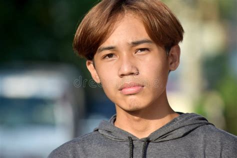 A Serious Philippine Boy Youth Stock Image - Image of reticent, unemotional: 222226117