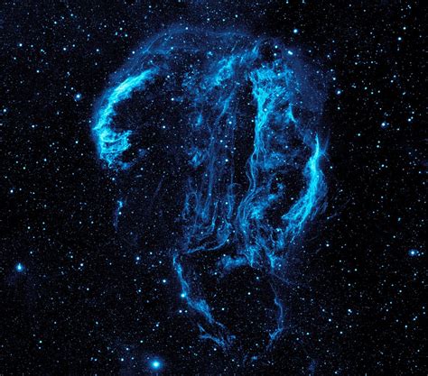 Shockwave in the skies: Wispy blue 'smoke' captured by space telescope is remnant of a supernova ...