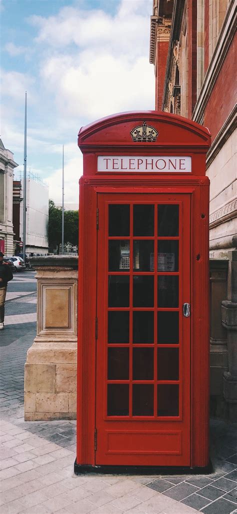 photo of red telephone booth iPhone Wallpapers Free Download