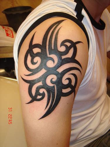 Tribal back tattoos designs | Sopho Nyono