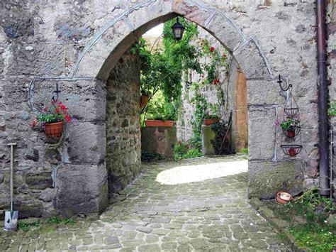 Castle Courtyard | Castle, Stone archway, Courtyard