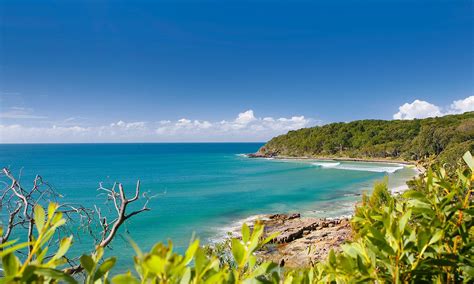 Noosa, Australia. World-class point breaks with a stunning National Park.