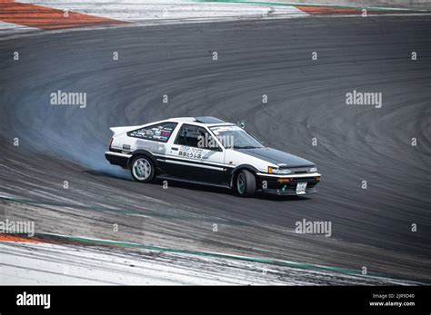 A Toyota Corolla Sprinter Trueno AE86 practicing drifting techniques on ...