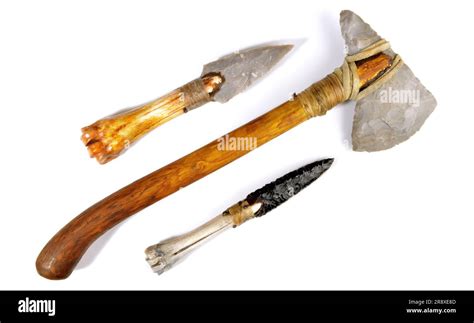 Stone Age Tools on white Background - Stone Age Axe, Knives and Arrows Stock Photo - Alamy