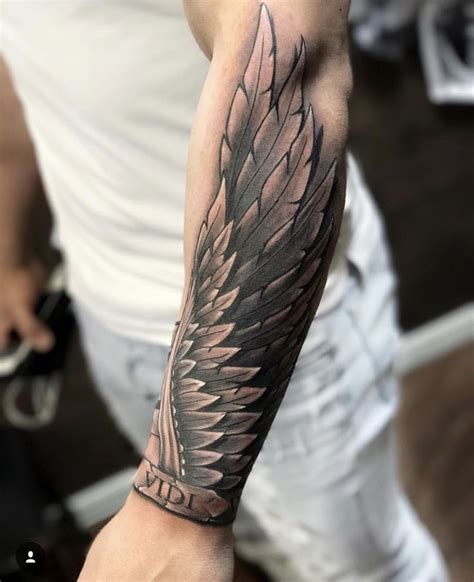 Angel Wings Arm Tattoo | Wing tattoo men, Forearm tattoo men, Arm ...