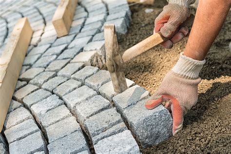 Polymeric Sand Vs Regular Sand: Which Is Best For Pavers? - PavingPlatform.com